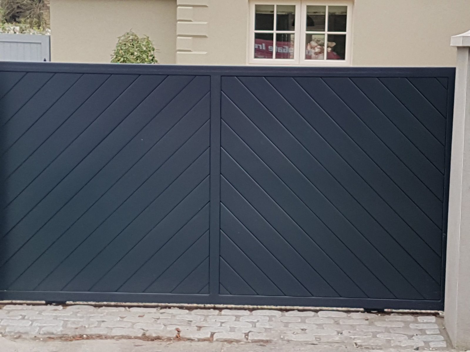 Herringbone-panel gates like these for homes in Hamiltonsbawn